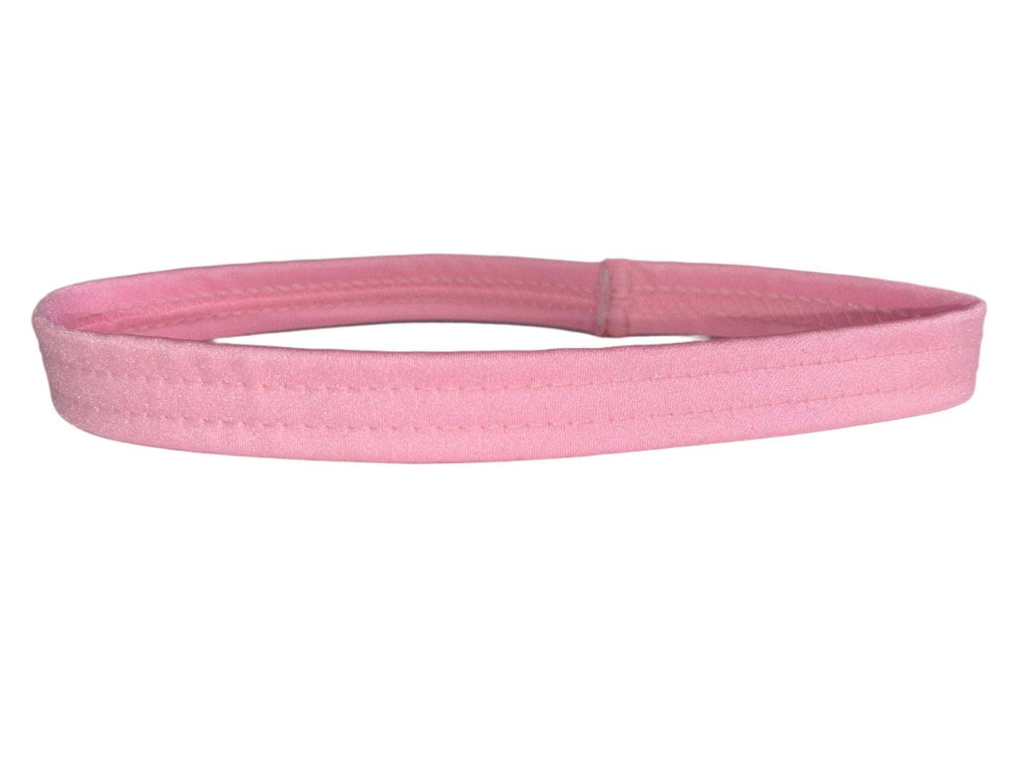 Baby pink thigh garter made of stretch elastic, worn by exotic dancers as a money band.