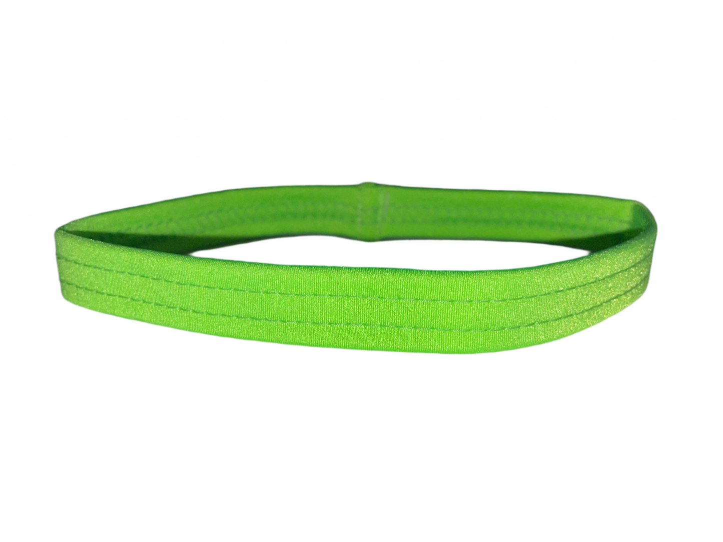 Neon green thigh garter made of stretch elastic, worn by exotic dancers as a money band.