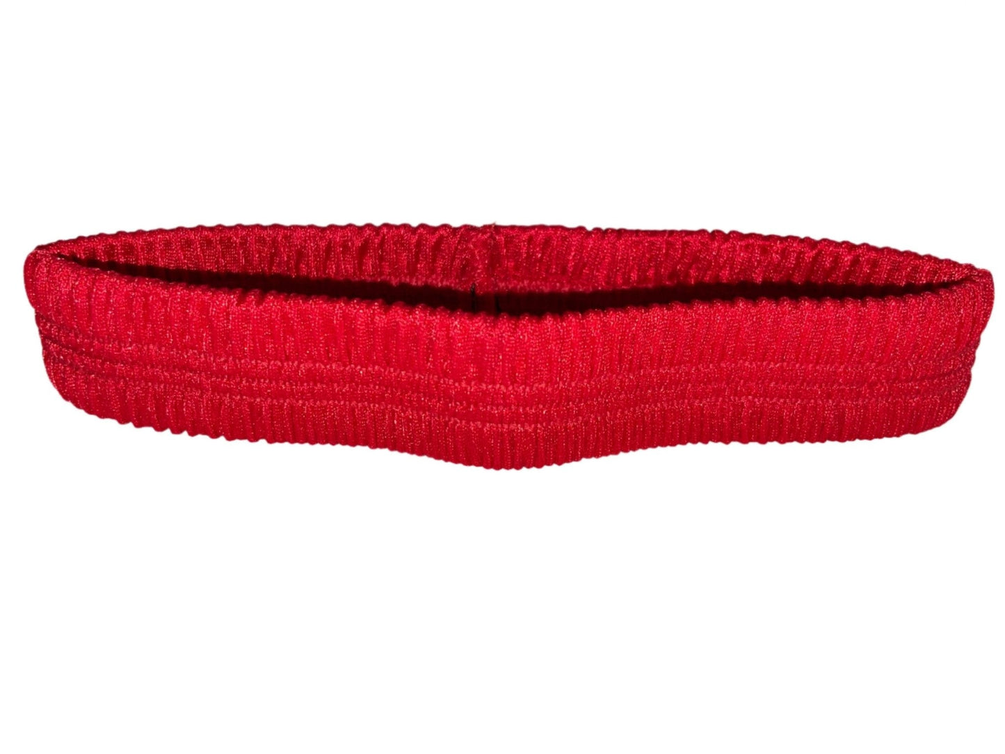 Red thigh garter made of stretch elastic, worn by exotic dancers as a money band.
