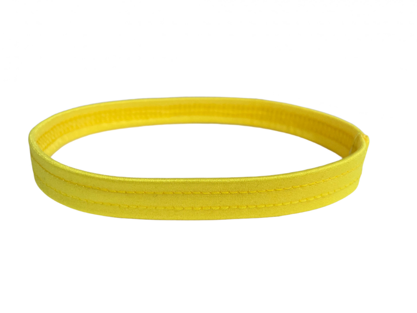 Yellow thigh garter made of stretch elastic, worn by exotic dancers as a money band.