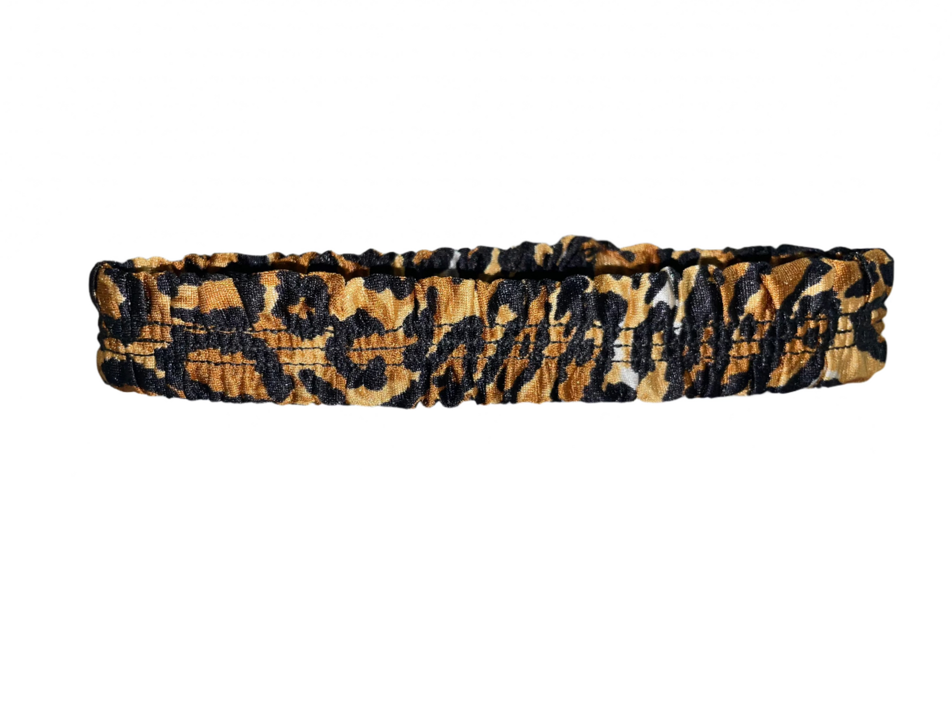 Leopard print thigh garter made of stretch elastic, worn by exotic dancers as a money band.